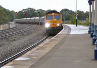 GBRf 66725 'Sunderland', with the recently introduced 4N83 working from Tyne Dock coal terminal to New Cumnock, passes through Kilmarnock station on 2 September 2011.<br><br>[Ken Browne 02/09/2011]