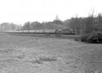 An EE Type 4 northbound near Auchencastle in the 1960s. The train is the combined ex-Liverpool & Manchester morning service which will split at Carstairs into Glasgow & Edinburgh portions.<br><br>[Robin Barbour Collection (Courtesy Bruce McCartney) //]