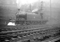 C16 4-4-2T no 67492 adding to the haze hanging over St Margarets shed on 6 September 1958. The locomotive took charge of that days SLS <i>Lothian Lines Tour</i> from Edinburgh Waverley, visiting various locations in Edinburgh and the Lothians.<br><br>[Robin Barbour Collection (Courtesy Bruce McCartney) 06/09/1958]