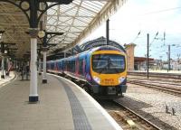 The 10.48 Scarborough - Liverpool Lime Street TransPennine service, recently arrived at York on 29 June 2011. The train is standing at platform 4, which is used only by trains arriving off the Scarborough line.<br><br>[John Furnevel 29/06/2011]