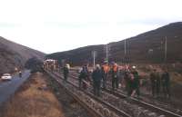 A PW gang at work at Slochd summit in 1974. Fourth from the right is a young DS, taking a sneaky break from the most physically demanding work he'd experienced in his life.<br><br>[Frank Spaven Collection (Courtesy David Spaven) //1974]