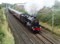 A new face puts in an appearance on <I>The Fellsman</I>. LMS 5MT 4-6-0 45231 took a turn on the penultimate <I>Fellsman</I> from Lancaster on 7 September 2011. 24 hours previously the area was suffering from torrential downpours and flooding but things were a little improved on this particular morning. Here the Black 5 gets into its stride after climbing the bank out of Lancaster and heads south for Preston approaching Oubeck Loops. <br><br>[Mark Bartlett 07/09/2011]