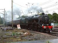 Black 5 no 45231 arrives back in Preston with <I>The Fellsman</I> on a wet and murky evening on 7 September 2011. The locomotive looked in fairly good condition with the exception of the smokebox which appears to have suffered from a summer in the West Highlands. <br>
<br><br>[John McIntyre 07/08/2011]