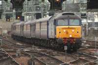 47841 at the head of the 'Cruise Saver Express' coaching stock being brought into Glasgow Central on a special service. Cruise Saver Travel, who run the service, arranged for the train to be brought to Glasgow Central for a special Q&A session for a couple of hours. The train was used next day on it's normal scheduled service, going from Glasgow Central to Southampton<br><br>[Graham Morgan 01/09/2011]