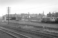 Vew from an excursion train passing through Bathgate yard in 1973, some 7 years after official closure of the shed. Three class 20 locomotives are stabled alongside, with much of the associated track having been lifted by this stage.<br><br>[Bill Roberton //1973]