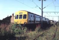 Looking back towards Shettleston Junction signal box from the remains of the former NB route to Bothwell and Hamilton. The DMU is the BLS Lanarkshire and Ayrshire railtour which had originated from Glasgow Central. [See image 18031] <br><br>[Ian Dinmore 26/08/1978]