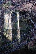 Very little remains of the substantial Victoria Viaduct over the South Esk. This is the base a pier on the northern side of the river. The viaduct was described by Hajducki as carried 'on a series of slender Danzig timber arches'. The viaduct was later rebuilt with girders to carry the Dalkeith Branch of the North British which ran from Hardengreen to Smeaton. The line fell out of use in 1934 and the viaduct was demolished in 1940. This photograph was taken in the winter of 2004, it is difficult to find anything in the summer!<br><br>[Ewan Crawford 26/12/2004]