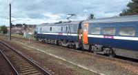 A Kings Cross - Edinburgh 'East Coast' service held on the platform line at Dunbar on 11 September 2011 due to a points failure north of the station. Photograph taken from a northbound HST standing alongside.<br><br>[Andrew Wilson 11/09/2011]