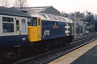 Shortly before repainting in ScotRail livery as part of the BR sectorisation policy, 47 712 <I>Lady Diana Spencer</I> heads a push-pull set through Dunblane on a Glasgow Queen Street-Aberdeen service.<br><br>[Mark Dufton 09/03/1985]