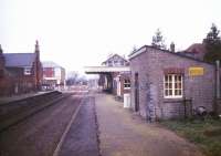 Platform view at Yaxham in January 1988, looking north west towards the level crossing<br><br>[Ian Dinmore /01/1988]