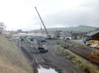 <I>The replacement bus service will leave from the front of the station</I>.... 'rationalisation' work in progress at Largs in 1986. On the right the 'kit points' are ready to be put in place. [See image 24726]<br>
<br><br>[Colin Miller //1986]