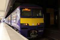 Newly refurbished 320314 pauses at Glasgow Queen Street Low Level on 2 September with a service to Dalmuir.<br><br>[Graham Morgan 02/09/2011]