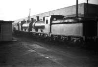 A pair of J36 0-6-0s, nos 65253 + 65323, standing alongside Dunfermline shed on a quiet looking Wednesday afternoon in February 1959.<br><br>[Robin Barbour Collection (Courtesy Bruce McCartney) 11/02/1959]