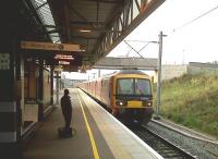 No less than 12 cars of class 325 stock run North through Milton Keynes bright and early on 2nd September.<br><br>[Ken Strachan 02/09/2011]