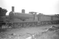 Drummond ex-Caledonian 0-6-0 no 57279 on Ayr shed in July 1959. The locomotive is recorded as being withdrawn from Ayr in October that year and cut up at Inverurie works the following month.<br><br>[Robin Barbour Collection (Courtesy Bruce McCartney) 28/07/1959]