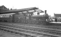 65033  stands at the platform at Barnard Castle on 7 May 1960 at the head of three Gresley teak-bodied coaches forming the joint RCTS (NE Branch)/Stockton & Darlington Locomotive Society J21 Railtour [see image 32382].<br><br>[K A Gray 07/05/1960]