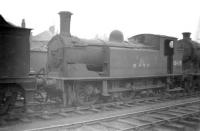 Holmes class J83 0-6-0T no 68478 stands in the withdrawn locomotive sidings at Bathgate in April 1959, with the faded signs of a bygone age showing through the paintwork.<br><br>[Robin Barbour Collection (Courtesy Bruce McCartney) 21/04/1959]
