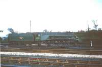 Looking east across the running lines at Kingmoor in the 1960s with A4 Pacific no 60024 <I>Kingfisher</I> on the shed's turntable.<br><br>[Robin Barbour Collection (Courtesy Bruce McCartney) //]