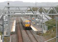 The 11.21 Edinburgh Waverley - Helensburgh Central arrives at Armadale on a grey and damp 19 September 2011. Even the station pigeon looks fed up. <br><br>[John Furnevel 19/09/2011]