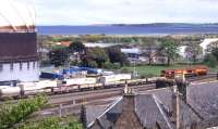 Classes 08, 66 and 37, with Safeway wagons to the fore, at the east end of Millburn Yard, Inverness, in 1999.<br>
<br><br>[David Spaven //1999]