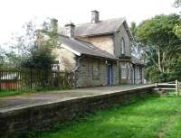 The old Border Counties station at Barrasford, looking north towards Reedsmouth on 25 September 2011. The station closed in 1956 although nowadays the building still sees regular use as the Barrasford Scout Centre.<br>
<br><br>[John Steven 25/09/2011]