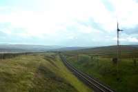 Bleak country indeed in this September 1964 view westwards from Douglas West towards Muirkirk, just a few weeks before complete closure of the line. [With thanks to all who responded to this query]<br><br>[Frank Spaven Collection (Courtesy David Spaven) /09/1964]