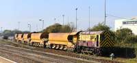 EWS liveried 08737 is the yard shunter at Westbury on 29 September 2011.<br><br>[Peter Todd 29/09/2011]