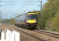 170639 photographed south of Cambridge heading towards Hinxton level crossing on 26 September 2011 with an Arriva Cross Country Birmingham to Stanstead Airport service.<br><br>[John McIntyre 26/09/2011]