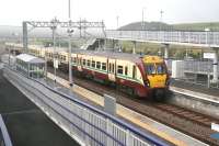 The 1039 Helensburgh Central - Edinburgh Waverley arrives at Blackridge on a misty 19 September 2011.<br><br>[John Furnevel 19/09/2011]