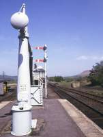 Platform view north east from Battersby towards the junction in 1987. The line splits just beyond the signal box turning north west towards Middlesbrough or straight on for Grosmont and Whitby. The northern edge of the North York Moors can be seen in the right background.<br><br>[Ian Dinmore //1987]