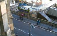 Included in the current 4 year improvement programme at Waverley are the Market Street entrance and the former 'sub' platforms 8 & 9 (including new canopies). View over Market Street on 27 September with a couple in the process of manoeuvering a pushchair down the steps to the cross-station walkway. [See image 41354]<br><br>[John Furnevel 27/09/2011]