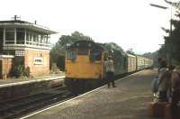 Token exchange with a Fort William-bound train at Spean Bridge in October 1980.<br><br>[Frank Spaven Collection (Courtesy David Spaven) /10/1980]