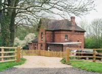 Stoke Bruern may be best known for its canal museum, but some way out of the village, there is (to the best of my knowledge) the only S&MJR station still standing - especially ironic as it was always freight only. Seen here in April 2010, it is now an elegant and peacefully located home.<br><br>[Ken Strachan 30/04/2010]