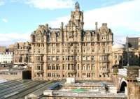 View north over the roof of Waverley station towards the Balmoral (formerly North British) Hotel on 27 September 2011. The narrow passageway to the left of the hotel links Princes Street and the station via (the currently closed) Waverley Steps. Princes Mall shopping centre, through which temporary access has been made available [see image 35912] stands to the left of the steps.  <br><br>[John Furnevel 27/09/2011]