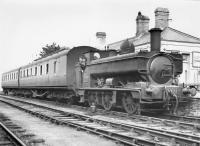 Armstrong GWR 850 class 0-6-0PT no 2011 of 1894/95 stands at the platform at Cardigan station [closed to passengers 1962]. Thought to have been taken in the early 1950s. [See image 35095]<br><br>[W A Camwell Collection (Courtesy Peter Francis)  //]