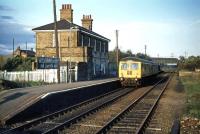 An Ipswich to Lowestoft DMU pauses at the down platform of Wickham Market for Campsea Ash station in November 1976. A more accurate description would have been Campsea Ash for Wickham Market - the latter being some 2 miles away.<br><br>[Mark Dufton 07/11/1976]