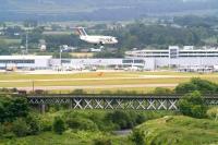 An Air France jet about to land at Edinburgh Airport in June 2008 flys low over the railway viaduct spanning the River Almond carrying the line between Edinburgh and the Forth Bridge. The location is just north of the site of the former Turnhouse station (closed 1930) and approximately 2 miles north of the planned interchange at Gogar where future passengers will transfer between trains and trams to connect with the airport. <br><br>[John Furnevel 26/06/2008]