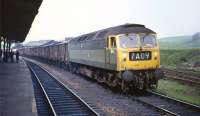 The 09.30 Carlisle Yard to Willesden partially fitted freight in the charge of Brush Type 4 No. 1943 standing in the up loop at Hellifield on 9 May 1970 undergoing a crew change.<br><br>[Bill Jamieson 09/05/1970]