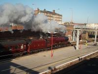 Not many trains pass through Preston non-stop these days but 6201 <I>Princess Elizabeth</I> did so on 15th October with the <I>Royal Scot</I> tour from Crewe to Carlisle. With County Hall in the background the driver of the LMS Pacific opens the regulator and accelerates through Platform 4 heading for the Lancaster lines.<br><br>[Mark Bartlett 15/10/2011]