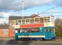 Tram no 69 from Wirral Transport Museum stands at Birkenhead Woodside on 16 October 2011. The tramway operates two Hong Kong trams built in 1992. These are numbered 69 and 70 to follow on from the original Birkenhead Corporation Trams whose numbers went up to no 68. Note part of the Royal Liver Building visible across the Mersey in the left background. [See image 34706] <br><br>[Bruce McCartney 16/10/2011]