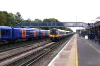 444043 runs west through Fleet station non-stop towards Basingstoke on 5 October 2011.<br><br>[Graham Morgan 05/10/2011]