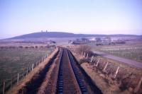 Mormond Hill, near Strichen, seen from the brake van of the daily Fraserburgh-Aberdeen goods on 27th March 1973.<br><br>[David Spaven 27/03/1973]