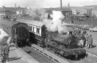 An SRPS Open Day at Stirling in 1972. Barclay 0-4-0ST Clydesmill No 3 shuttles around with a Caledonian railway coach, while in the right background the coal yard seems busy enough.<br>
<br><br>[Bill Roberton //1972]