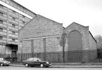 Part of the former Gorgie tram depot in Westfield Road, Edinburgh, in March 1992. The structure had been adapted for use by the adjoining bonded warehouse in the late 1950's. All now demolished.<br><br>[Bill Roberton 30/03/1992]