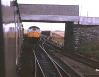 The Wick portion of an Inverness-bound train, captured from the Thurso portion, draws into Georgemas Junction in the summer of 1972. <br><br>[David Spaven //1972]