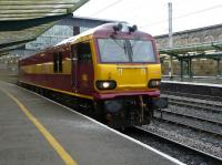 DBS red liveried 92031 <I>Institute of Logistics and Transport</I> with the 4M63 Mossend - Hams Hall Intermodal service. Photographed at Carlisle station platform 3 on on 18 October during a crew change.<br><br>[Ken Browne 18/10/2011]