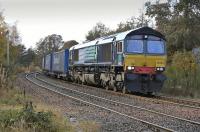 The Inverness - Grangemouth Stobart containers about to run through Pitlochry on 19 March 2011 behind DRS 66423.<br><br>[Bill Roberton 19/03/2011]