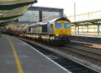 DRS Fastline 66434 TnT with DRS 66428 stands in the middle road with the 3J11 RHTT train, a Kingmoor round trip, on 18 October 2011.<br><br>[Ken Browne 18/10/2011]