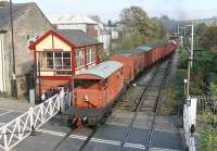 During the ELR Autumn Gala a demonstration freight ran between Bury and Ramsbottom several times each day. The rake of restored goods wagons made an impressive sight although due to the late non-availability of 71000 <I>Duke of Gloucester</I> the freight ran with industrial rather than mainline motive power. The train is seen here arriving at Ramsbottom and running through the station into the refuge loop.<br><br>[Mark Bartlett 22/10/2011]