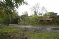 The station at Bowland, between Galashiels and Stow, closed to passengers as early as 1953. The wooden platforms and signal box have long gone, although the goods yard can still be identified. Bridge No 80, which carried the line over the B710, also survives and is used by local farm traffic. Passenger access to the station was via a ramp/stairway to the down platform on the other side of the bridge. View is south west from the former goods yard on 19 October 2011. [See image 25514]<br><br>[John Furnevel 19/10/2011]